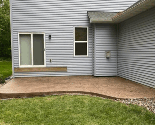 Patios and Walkways - small stamped stained concrete patio